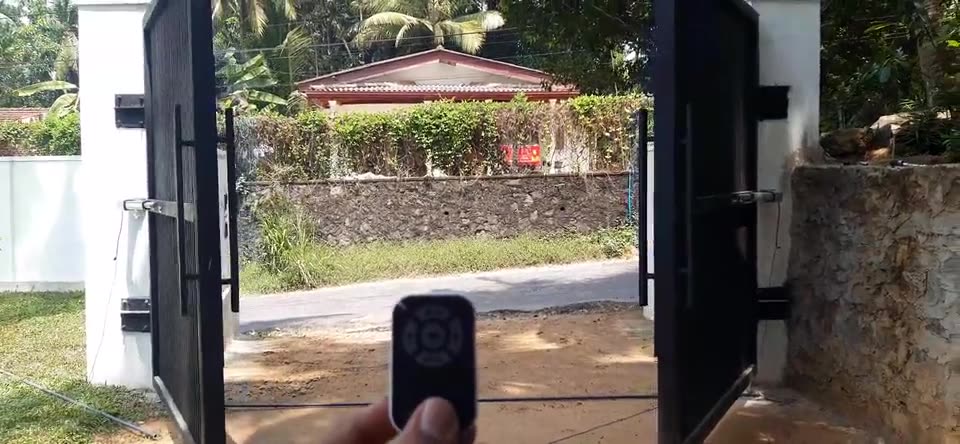 Double swing gate with auto gate motor installed by Keynode in Sri Lanka