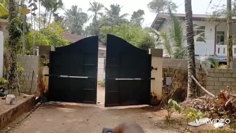 Double swing gate with auto gate motor installed by Keynode in Sri Lanka