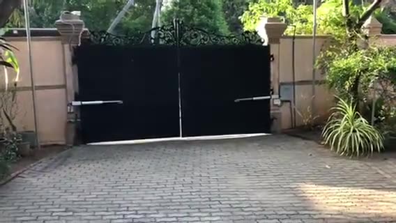 Double swing gate with auto gate motor installed by Keynode in Sri Lanka