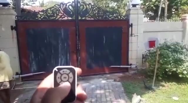 Double swing gate with auto gate motor installed by Keynode in Sri Lanka