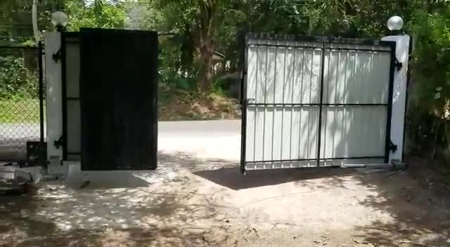 Double swing gate with auto gate motor installed by Keynode in Sri Lanka