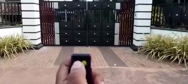 Double swing gate with auto gate motor installed by Keynode in Sri Lanka