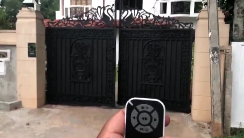 Decorative swing gate with auto gate motor installed by Keynode in Sri Lanka