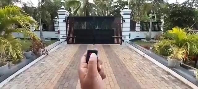 Double swing gate with auto gate motor installed by Keynode in Sri Lanka